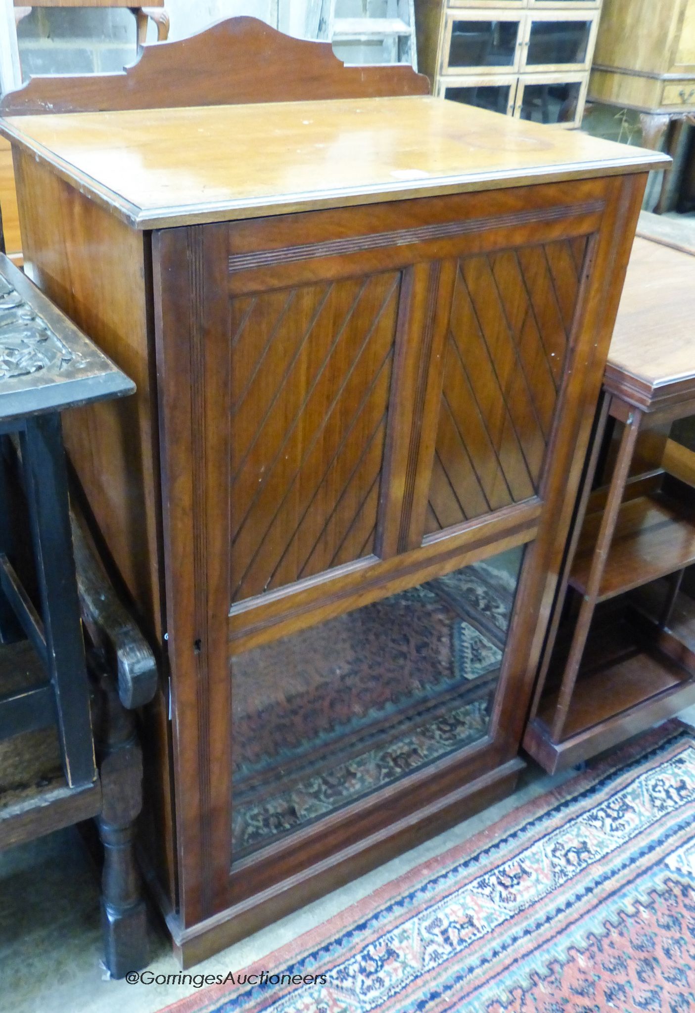 A late Victorian mahogany music cabinet, width 64cm, depth 45cm, height 117cm